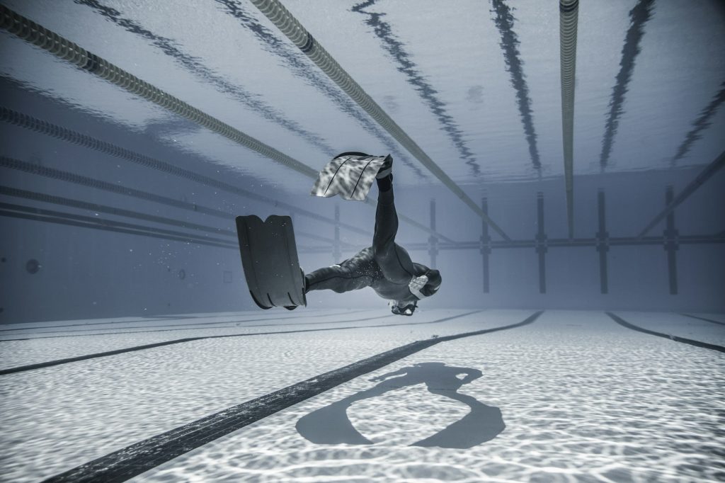 Freediver Performing during a DYN Freediving Competition